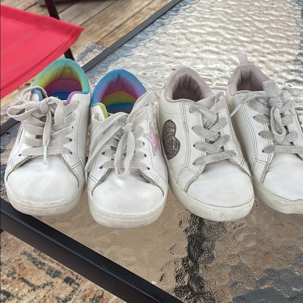 Pair of girls white sneakers